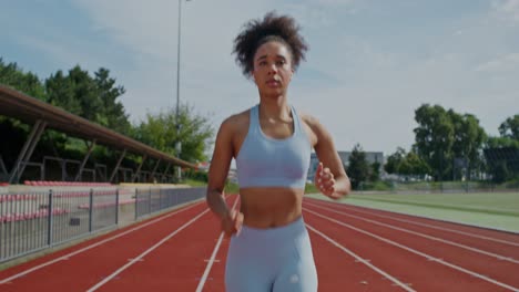 woman running on a track