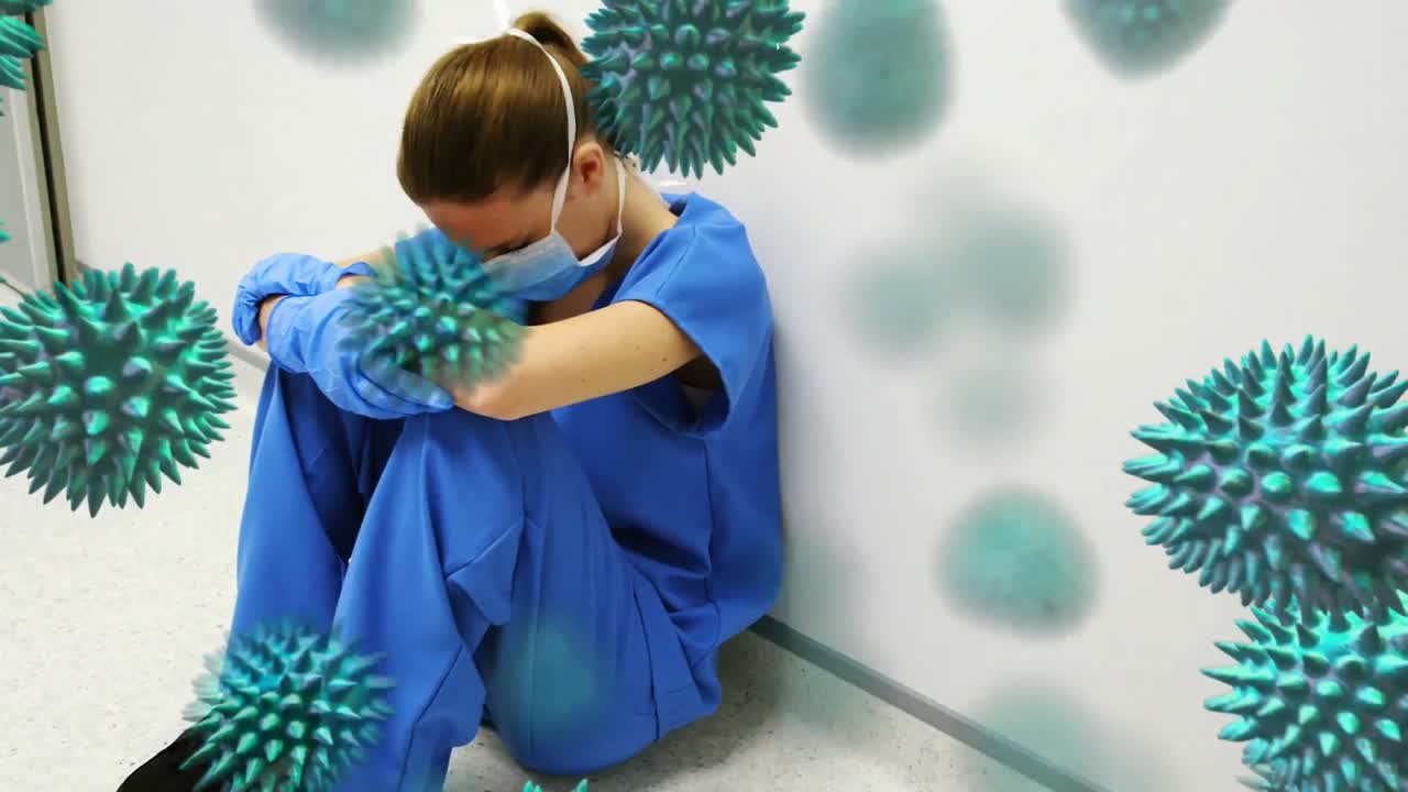 Animazione del coronavirus Covid-19 in diffusione con un operatore sanitario sullo sfondo.