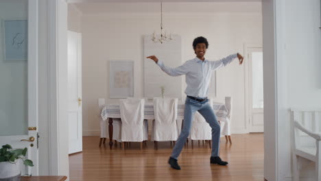 funny man dancing at home celebrating success with weird victory dance moves having fun feeling successful 4k