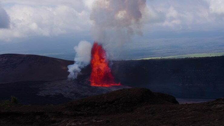 Slow motion molten lava surging from volcanic vent in Hawaii