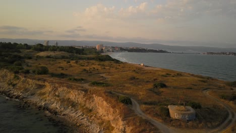 sunset at the beach near the world heritage site of nesebar in bulgaria