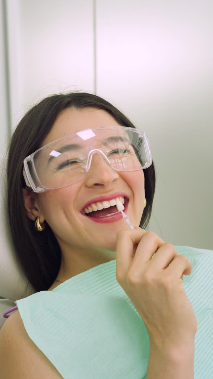 Hispanic Young woman laughing during dental consultation, teeth whitening