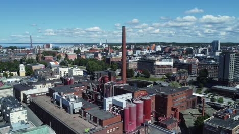 aerial view of a city with a large factory