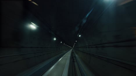 subway train running through the tunnel