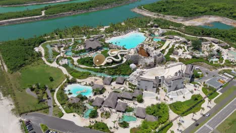 aerial orbit around amusement water park with slides in the caribbean