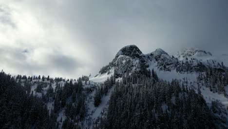 Stunning-Snow-Covered-Mountain-Peaks-with-Snowy-Trees