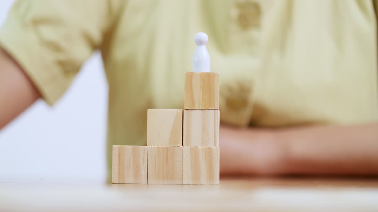 Explore how stacking wooden blocks fosters creativity and problem-solving skills in a home workspace