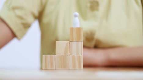 explore how stacking wooden blocks fosters creativity and problem-solving skills in a home workspace