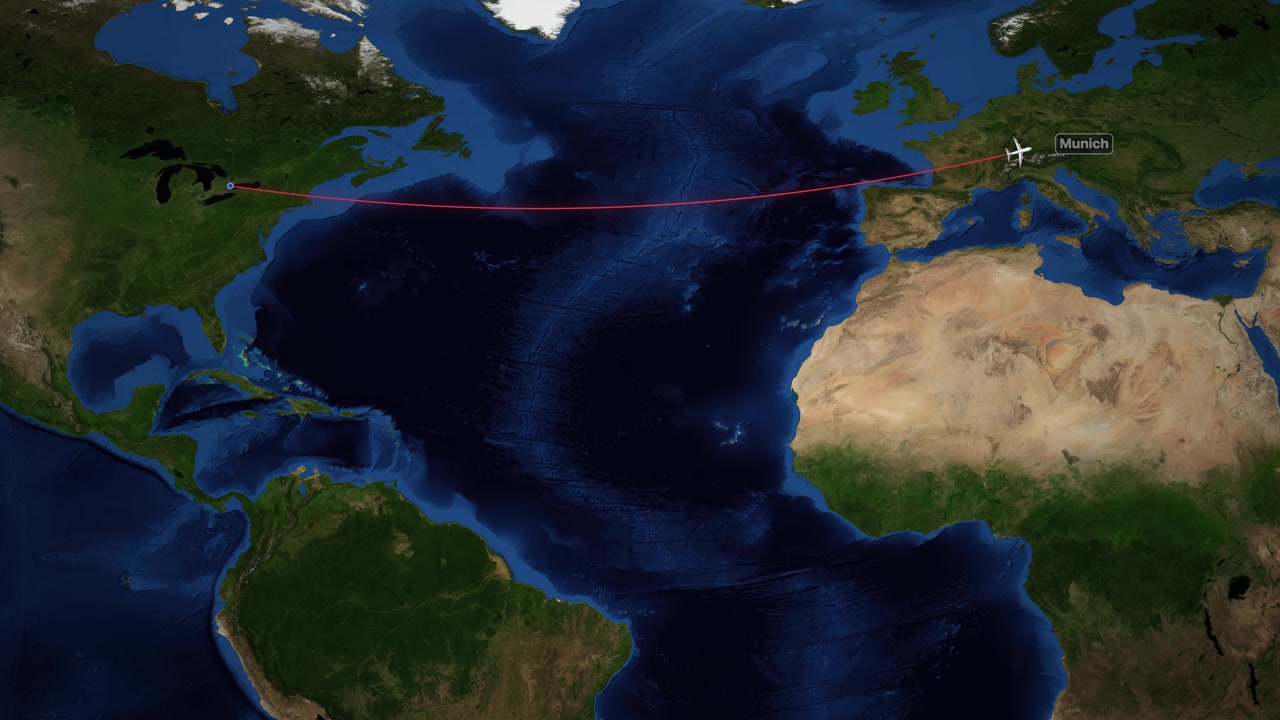 A digital animation tracks an airplane flying across the Atlantic Ocean between two major cities