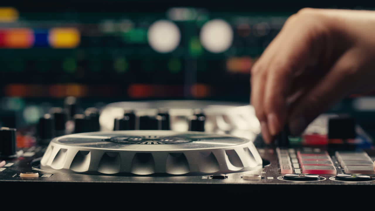 Vibrant DJ Mix Performance Closeup view of hands and equipment during a live music performance, city event, dj set in music techno club