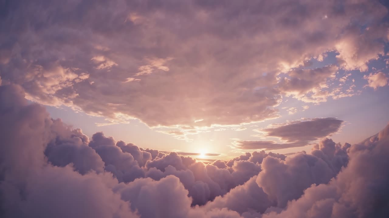 A serene video scene of a sunset above fluffy clouds, captured from a low angle