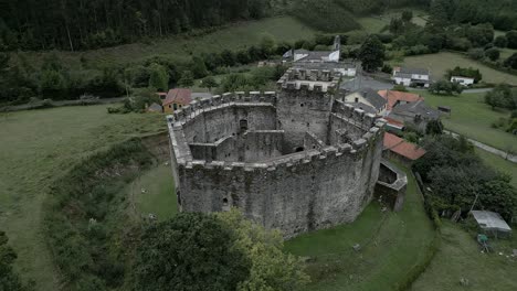 aerial circling moeche castle, galicia, spain