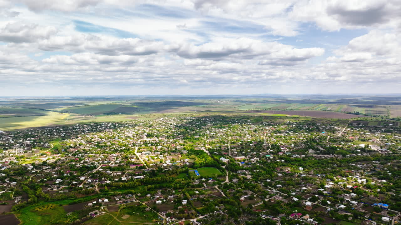Aerial drone view of Pelinia, Drochia, Moldova with a cloudy sky