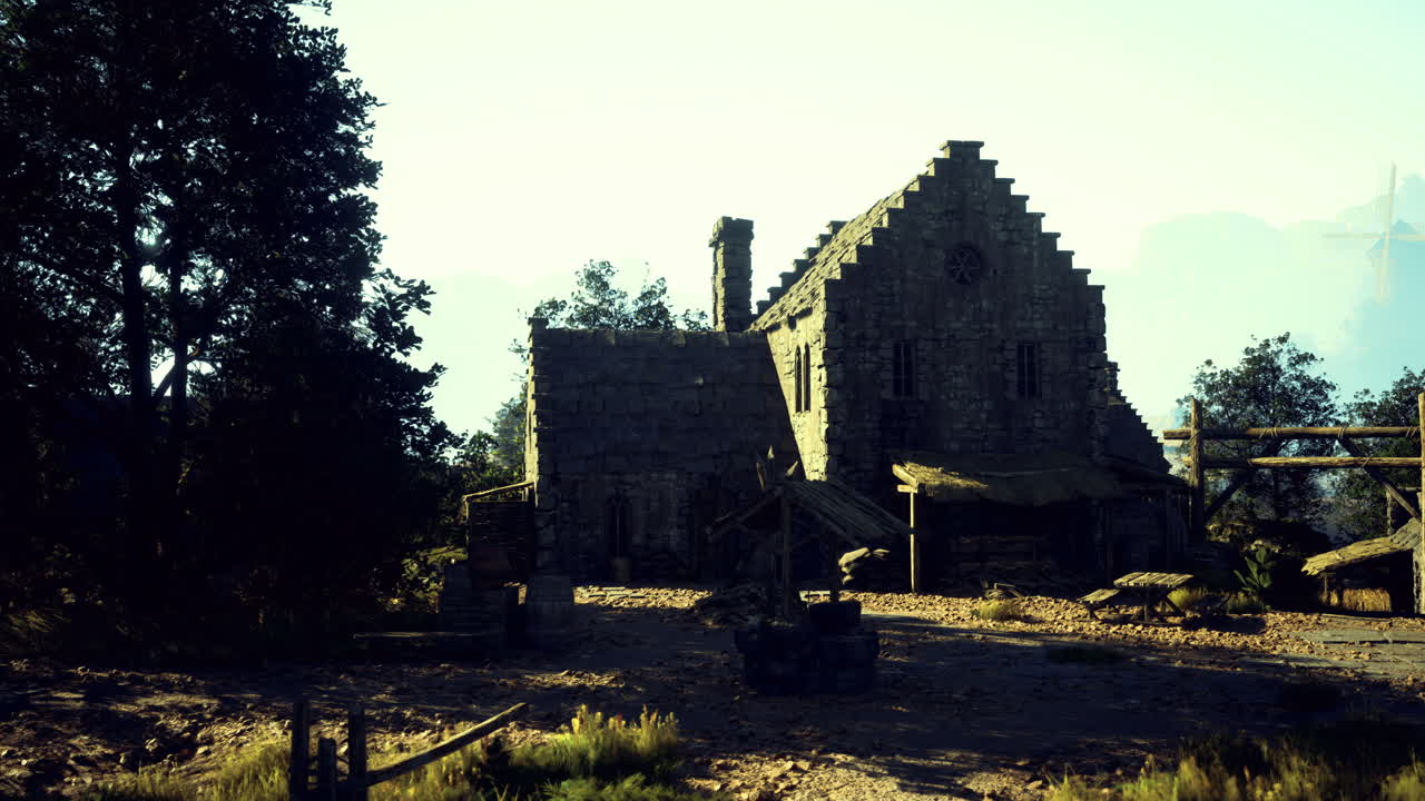 Historic stone building nestled in nature during golden hour light