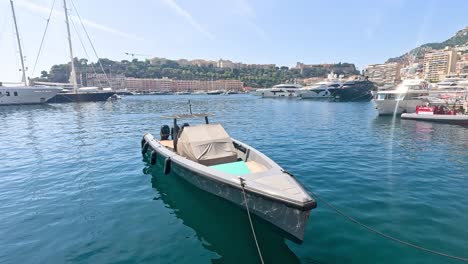 a boat docked in monte carlo harbor