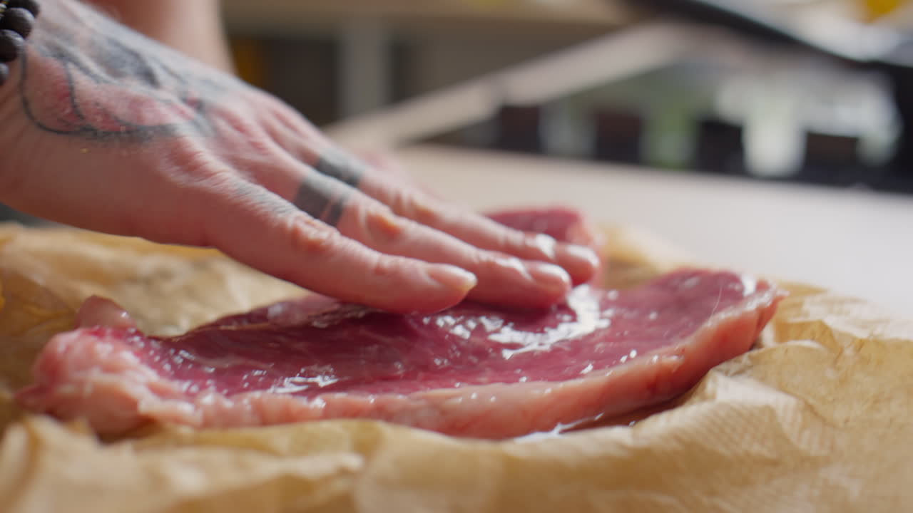 Putting Oil on Steak before Cooking