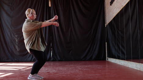 woman dancing indoors