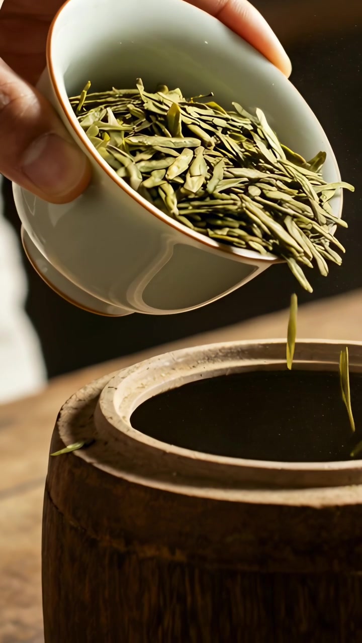 Vertical video: Lifting cup, maker pouring tea leaves into wood caddy on table for brewing