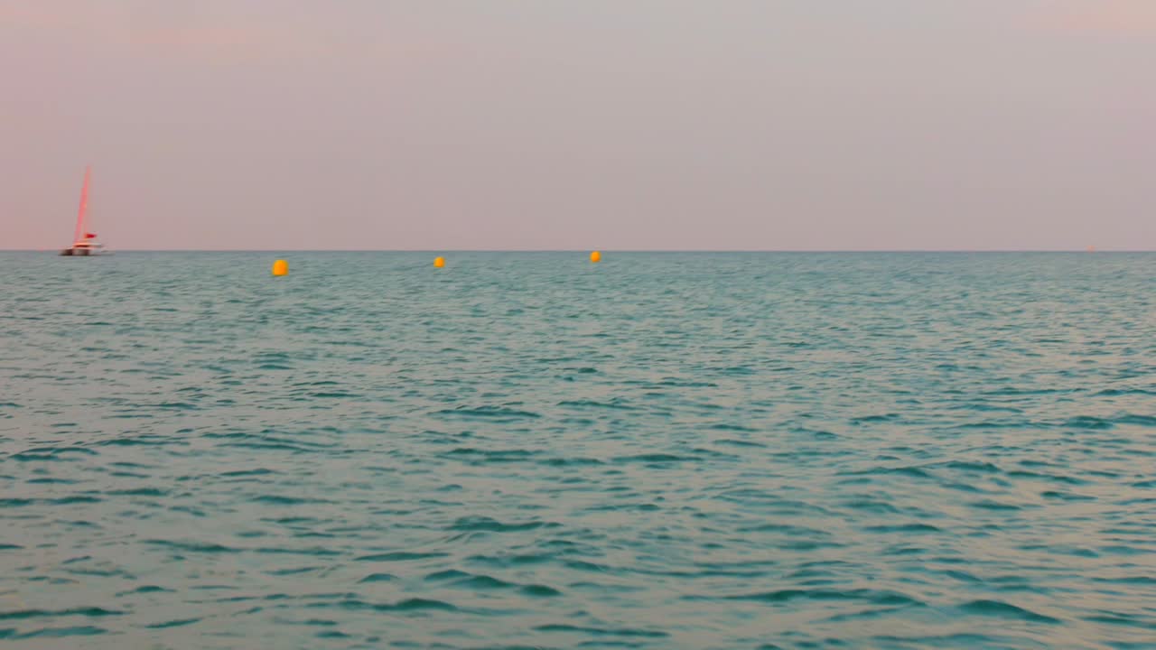 POV From A Boat Sailing In The Sea With Wavy Waters At Dusk. - wide shot