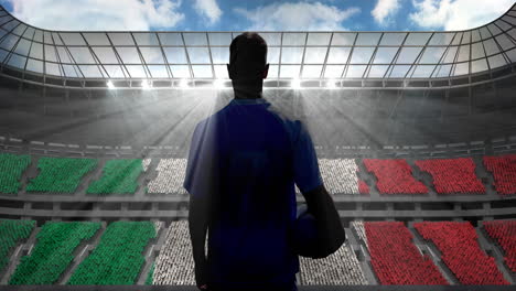 animation of rear view of football player holding ball over italian flag in sports stadium