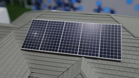 solar panel on a model house roof