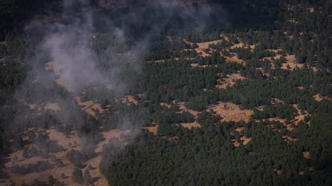Aerial drone shot of the mountainous port of Paso de Cortés captured after flying through a cloud bank in the metropolitan area of Mexico City