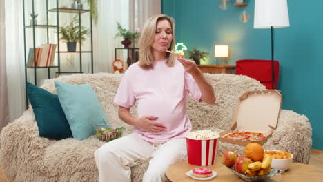 pregnant woman craving pizza chocolate fruit vegetables chips popcorn with strong pregnancy hunger