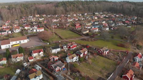 aerial footage of some beautiful picturesque cottages in delsjon, gothenburg, sweden-1
