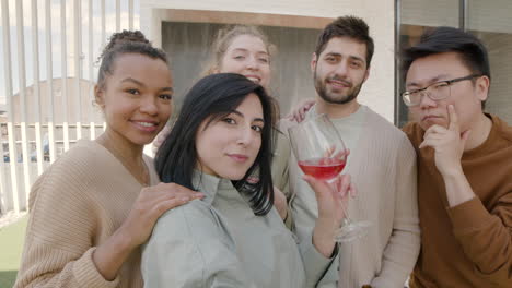 a nice  group of friends take a selfie while fooling around 4