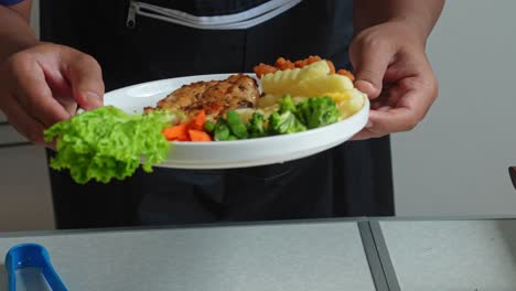 preparing and serving a healthy chicken steak meal