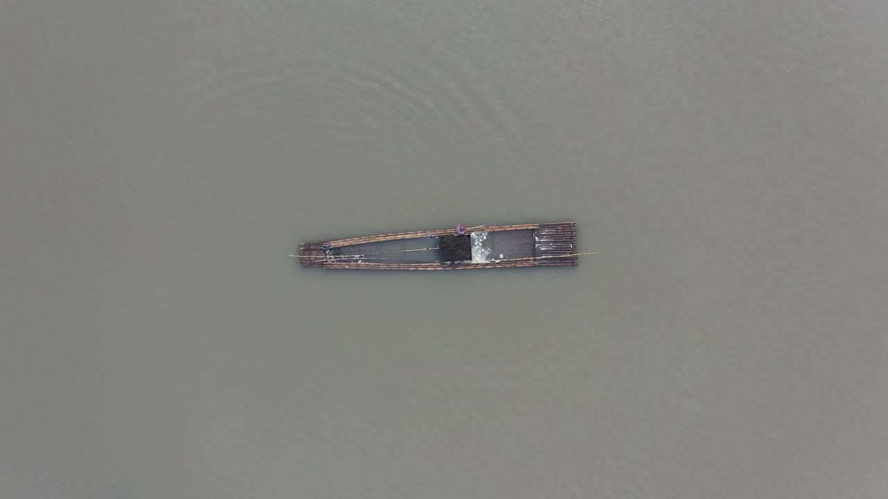 Bamboo Raft on a River