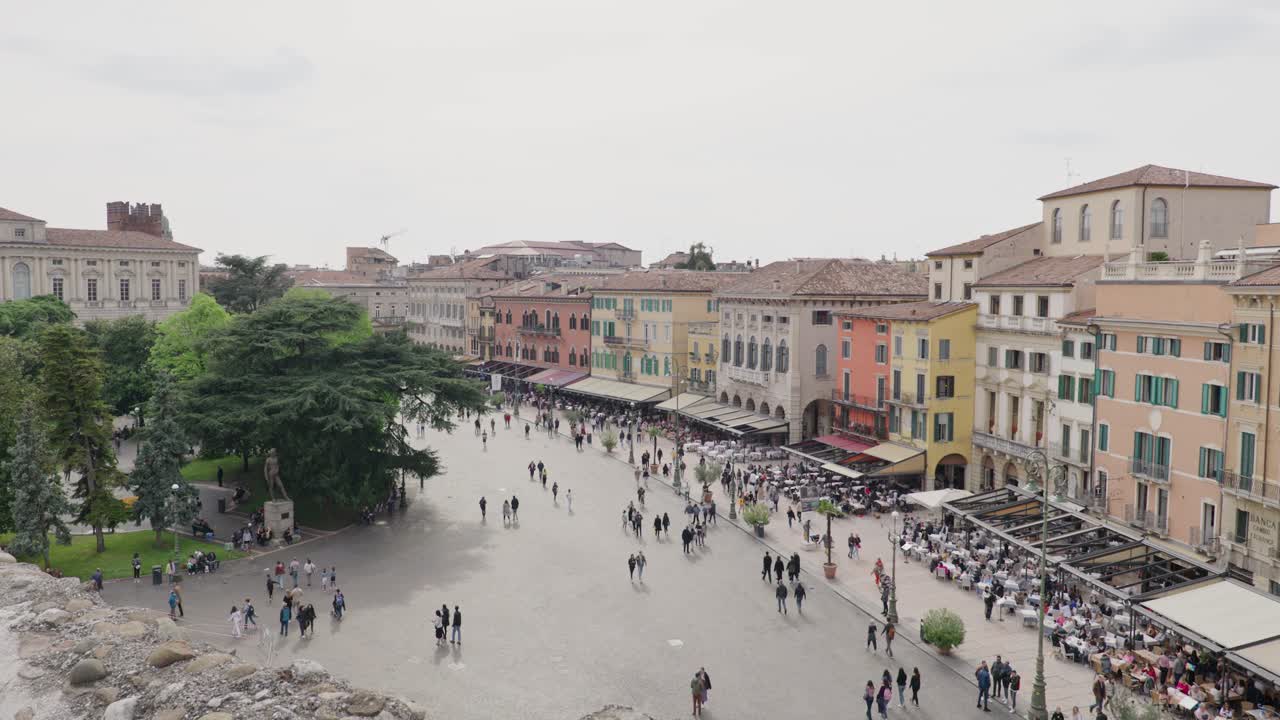 Panoramic View Of Piazza Bra With Buildings And People In Verona City Centre, Italy. Aerial Shot