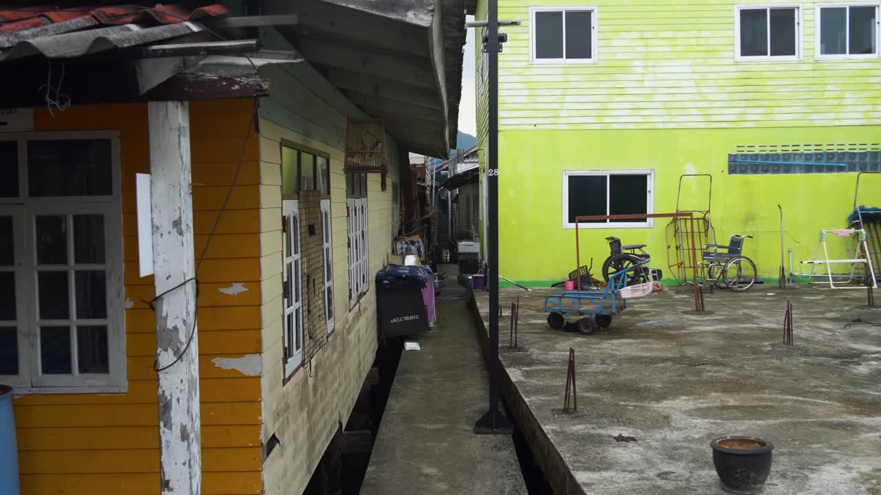 Typical Neighbourhood In The Muslim Fishing Village Of Koh Panyee, Phang Nga Province, Thailand. Static Shot
