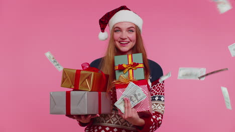 Christmas-Girl-holding-gift-boxes,-concept-of-spending-money,-shopping-online,-cash-dollars-falling