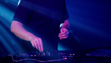 dj performance on stage with professional equipment