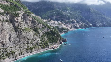 amalfi coast at positano in salerno italy. beach landscape. tourism landmark. amalfi coast at positano in salerno italy. gulf of salerno skyline. coastal cityscape. mediterranean sea.