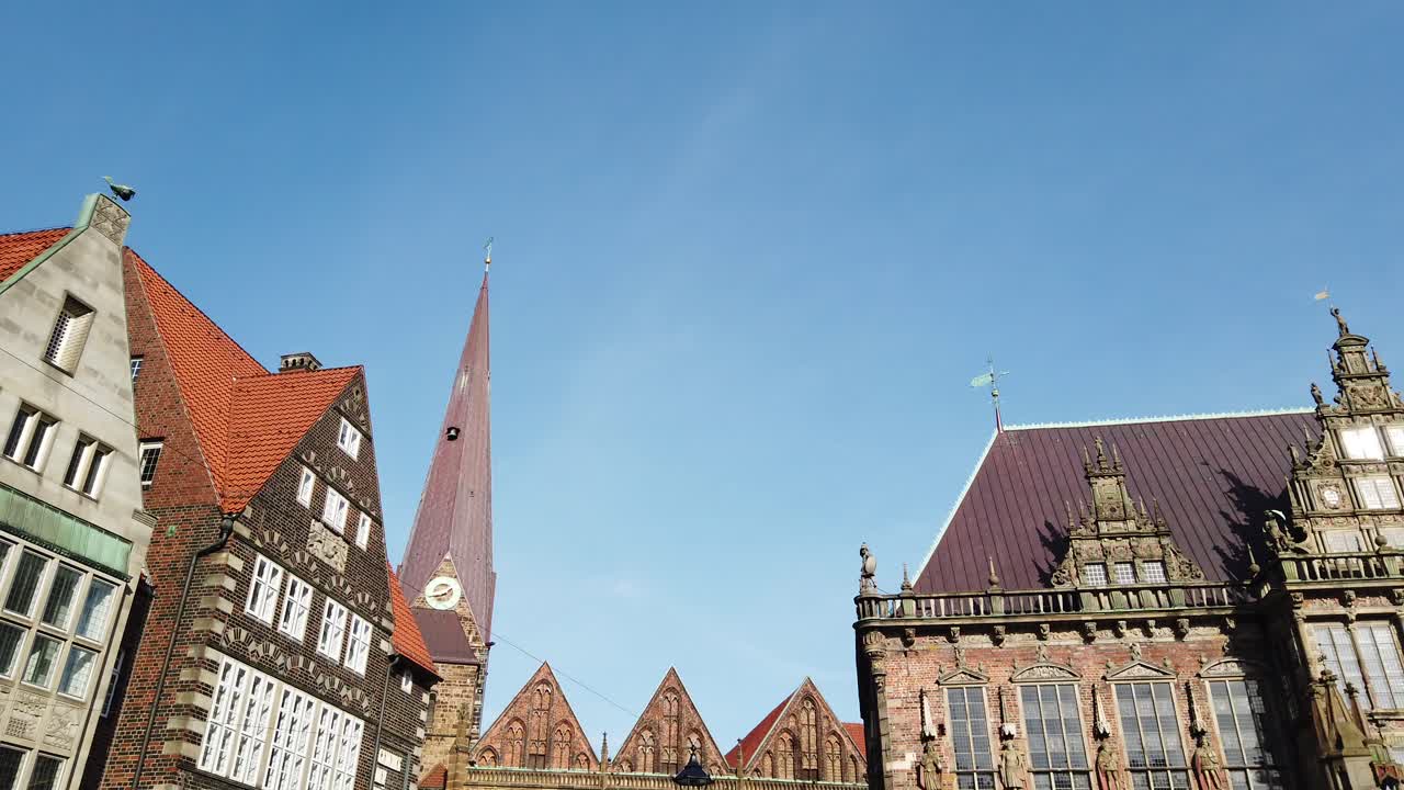 Bremen marketplace panning with old historic merchant houses and Bremen town hall UNESCO World Heritage Site