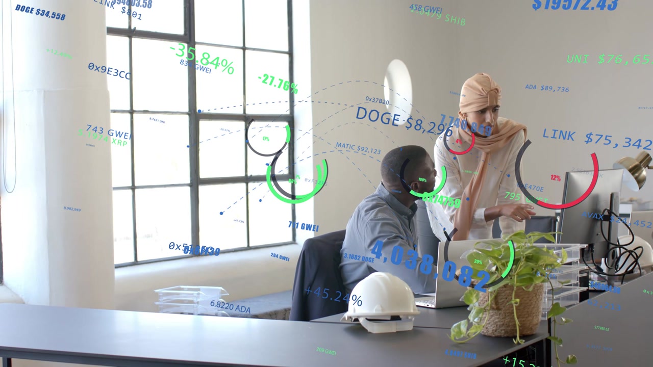 Woman in hijab coming to monitor pointing and helping seated man while AR finance tickers reacting