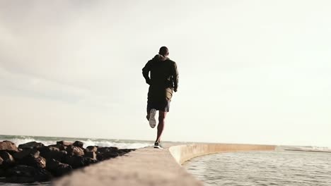 man running on the promenade