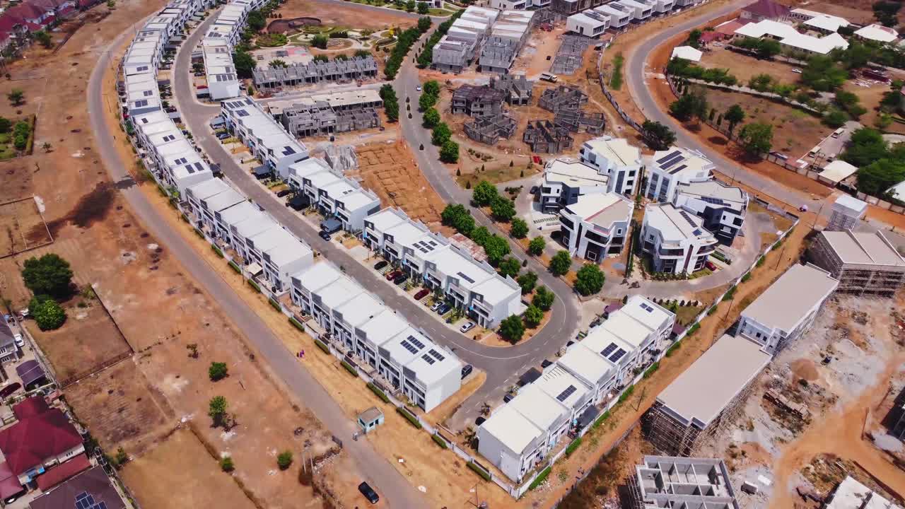 Aerial of luxury homes and a construction site in a wealthy suburban neighborhood at the Godab Estate in Abuja, Nigeria
