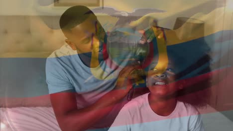 Animation-Der-Flagge-Kolumbiens-über-Einem-Afroamerikanischen-Mann-Und-Seiner-Tochter