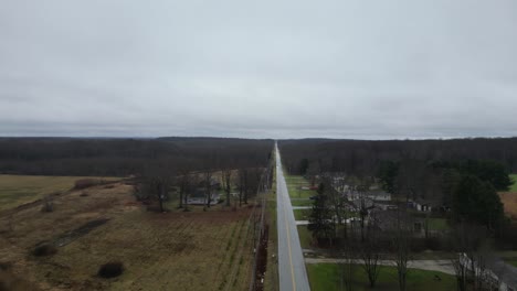 overtake shot of road middle of green nature in warren, ohio, usa