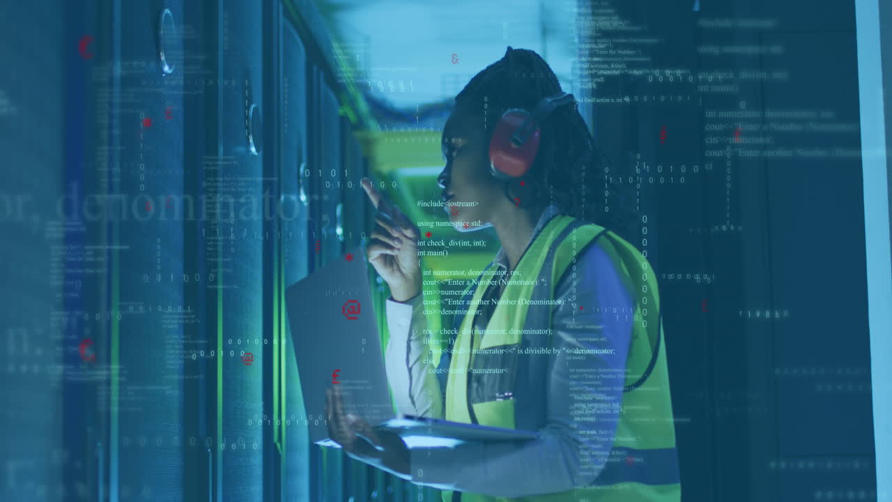 Animation of computer language, african american female engineer checking server using laptop