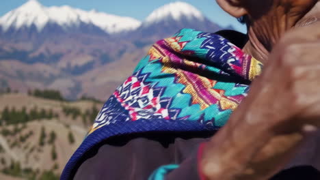elderly andean man in traditional attire