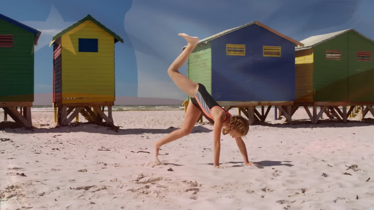 On sandy beach, child doing cartwheel near colorful beach huts, enjoying animation