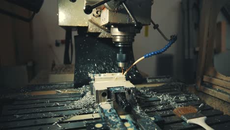 drilling metal plates with the help of a drill and water 4k