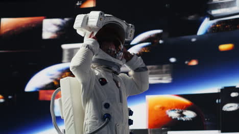 curious astronaut standing on a distant planet in space suit and helmet