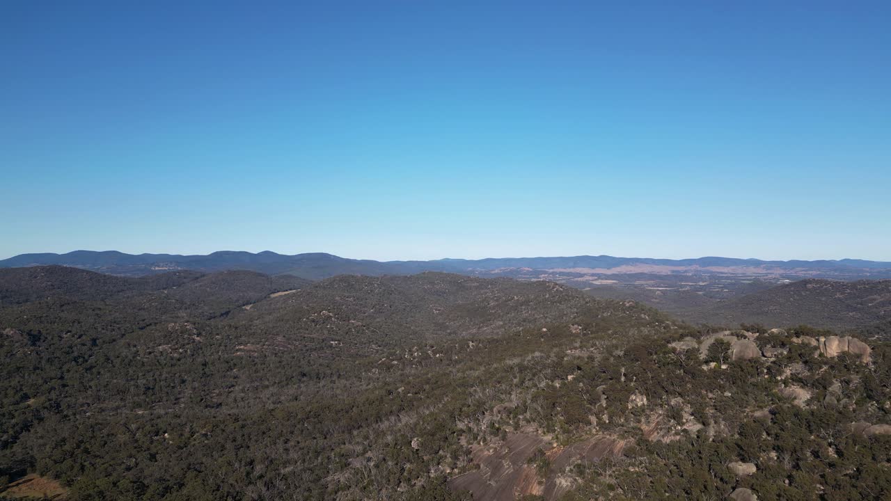 Forward aerial footage over Girraween National Park, Southern Queensland Australia. Girraween National Park is located near Stanthorpe and the Queensland and New South Wales border.
