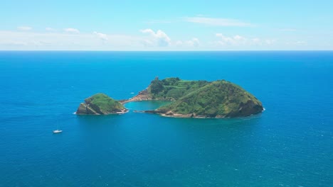 vila franca islet in são miguel with clear blue waters and lush green vegetation, aerial view