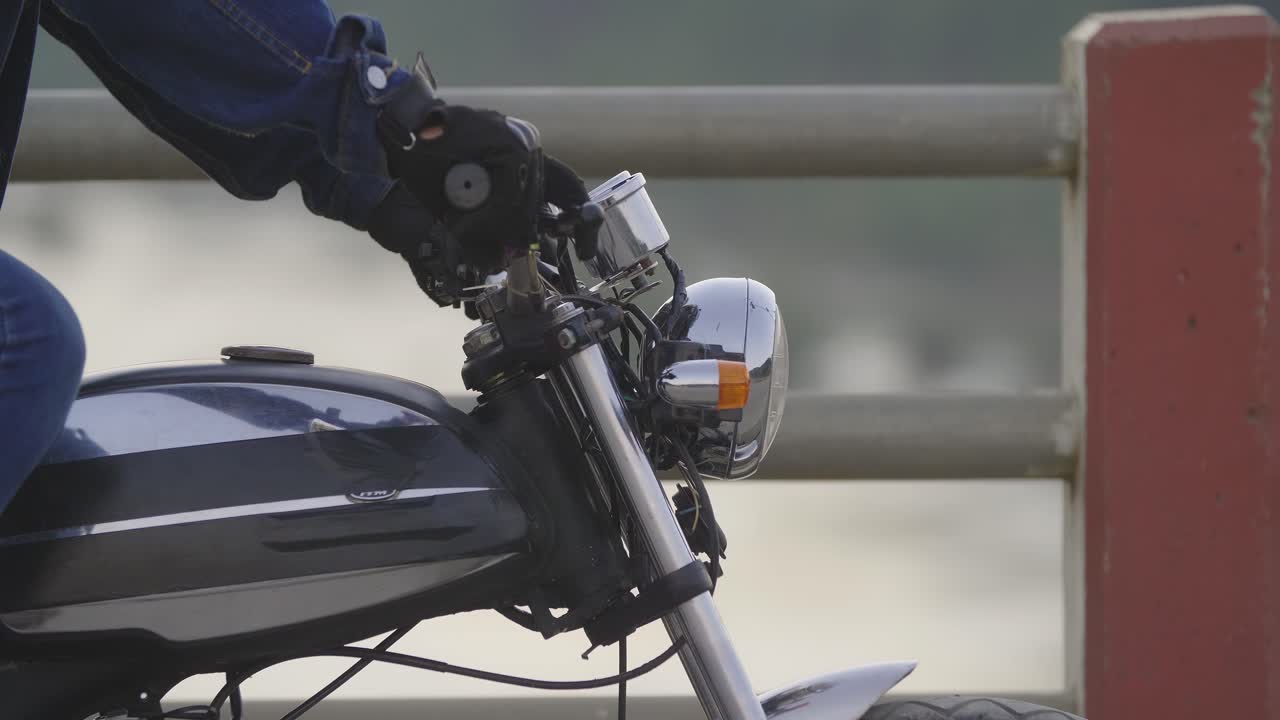 Person Riding a Classic Motorcycle